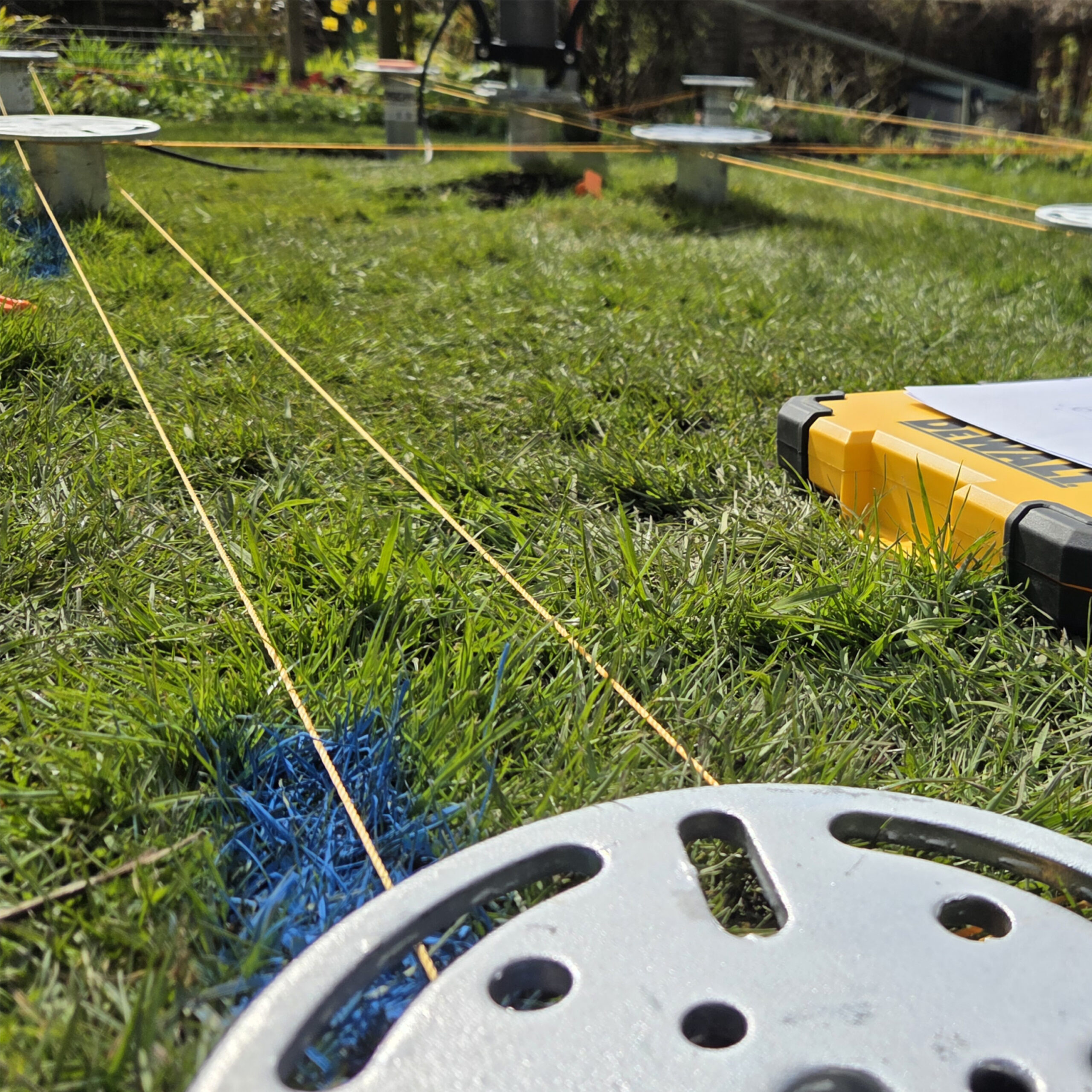 Installing heavy-duty commercial ground screws for outbuildings